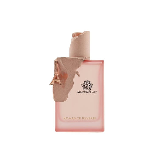 Perfume árabe Romance Reviere de Paris Corner 100ml femenino sobre fondo blanco, frasco rosa con torre Eiffel